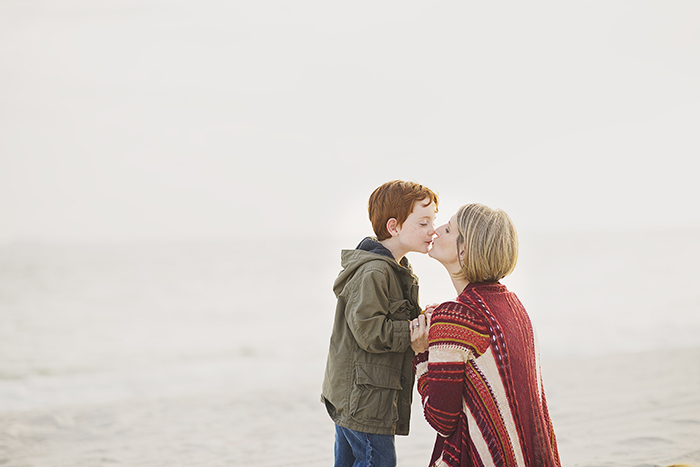 mommy and son kisses at Point Lookout Beach