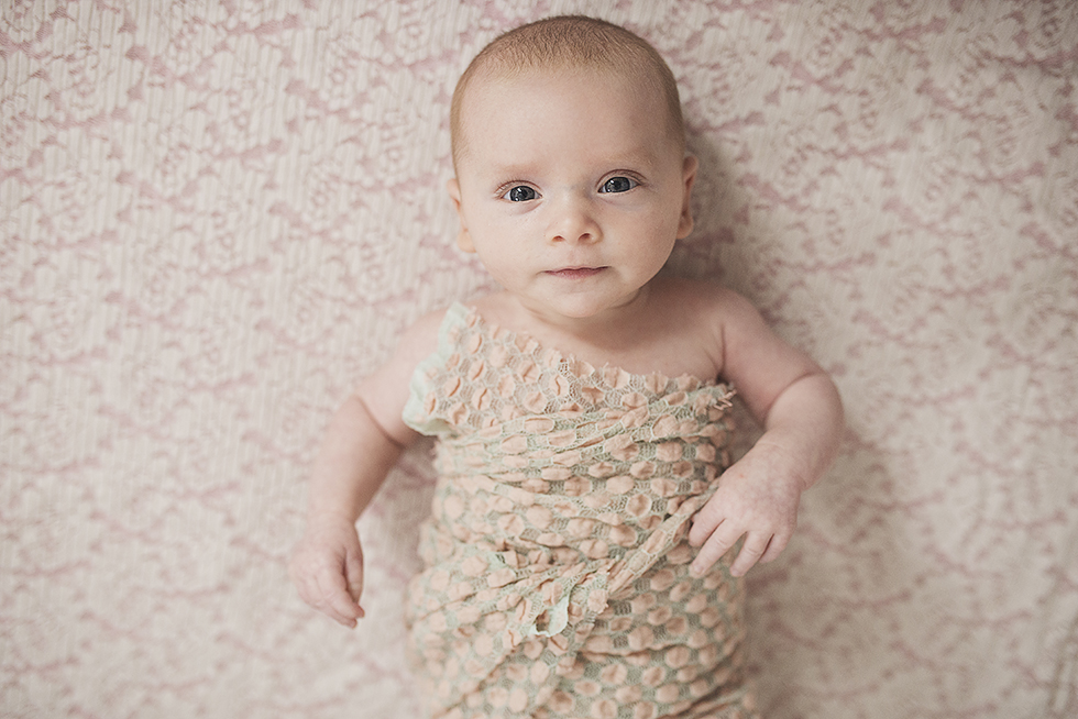 Long Beach baby girl in crib portrait