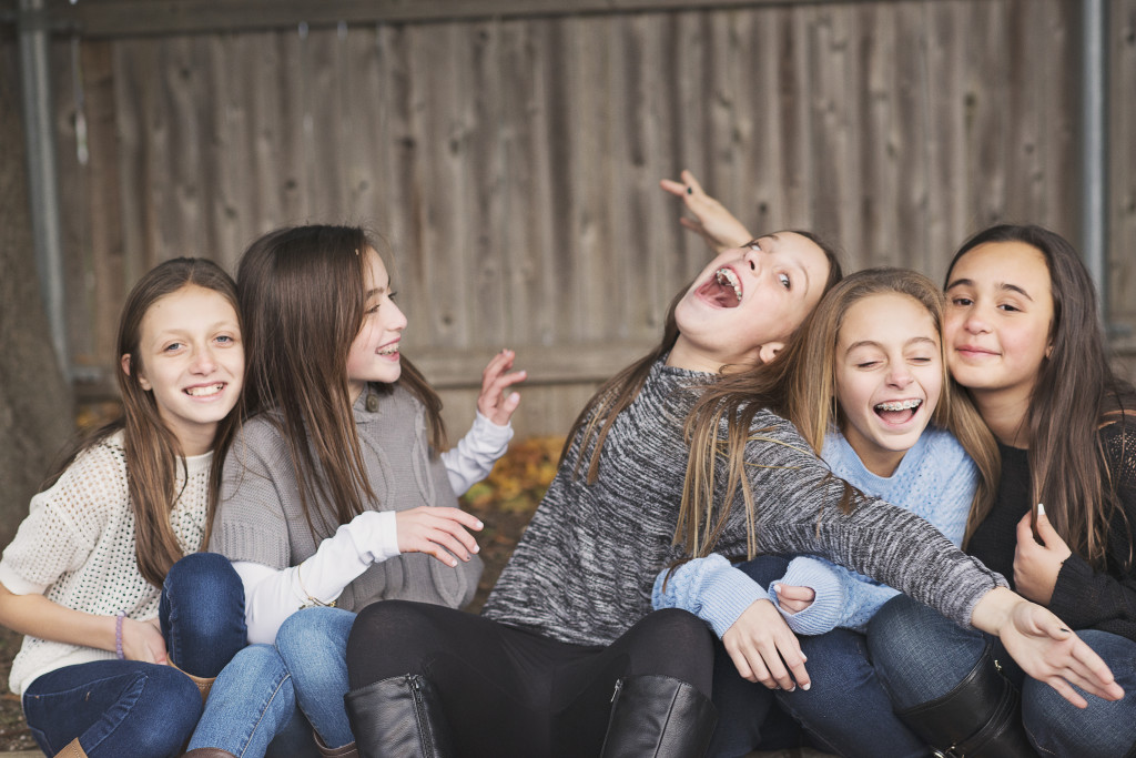 eleven year old girls goofing around