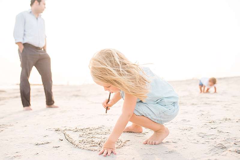Atlantic Beach Family Photographer girl finding shells