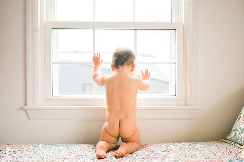 Long Beach Baby Photographer baby by her window
