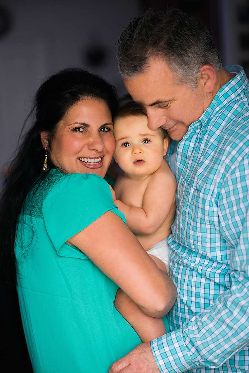 Long Beach Baby Photographer family of three in home