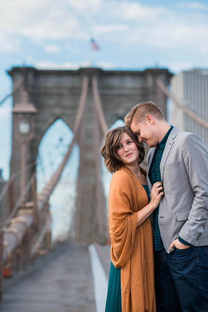 pretty young couple on the Brooklyn Bridge