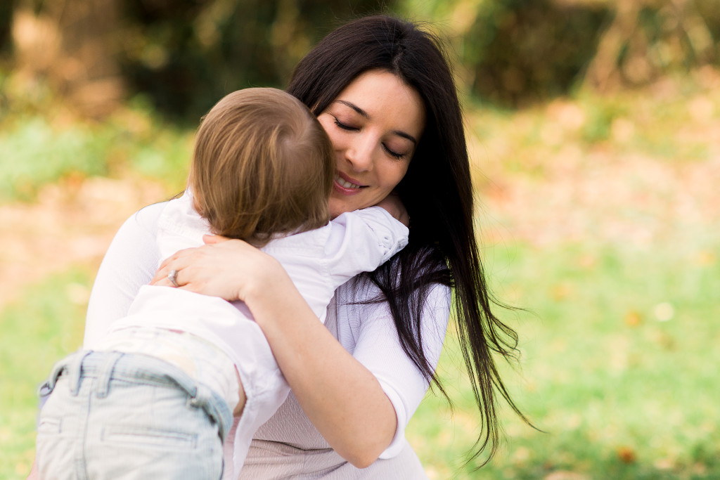 little boy hugging mommy