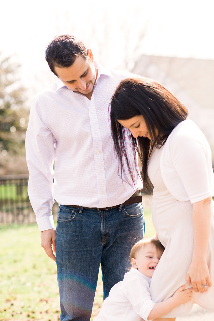 sweet little boy with mom and dad