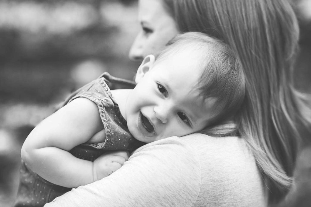 baby resting on mom's shoulder