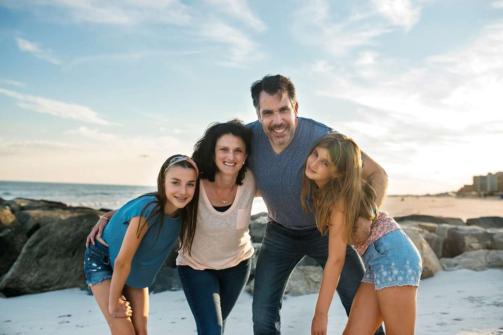 Family of four on the beach Long Beach New York