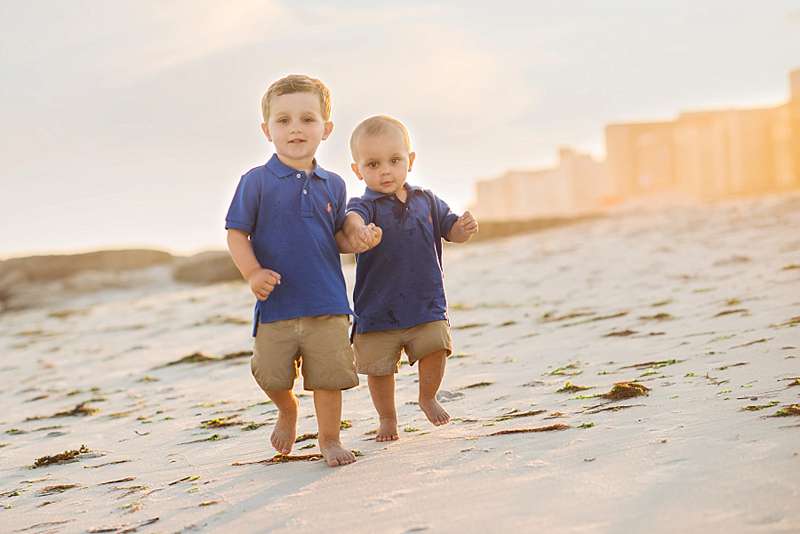 Rockville Centre Long Island brothers on the beach at sunset