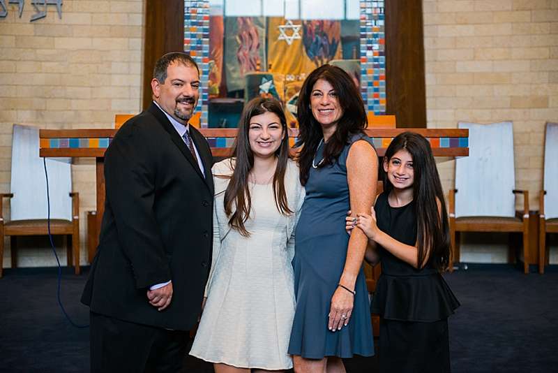 family photo on bima at Temple Avodah