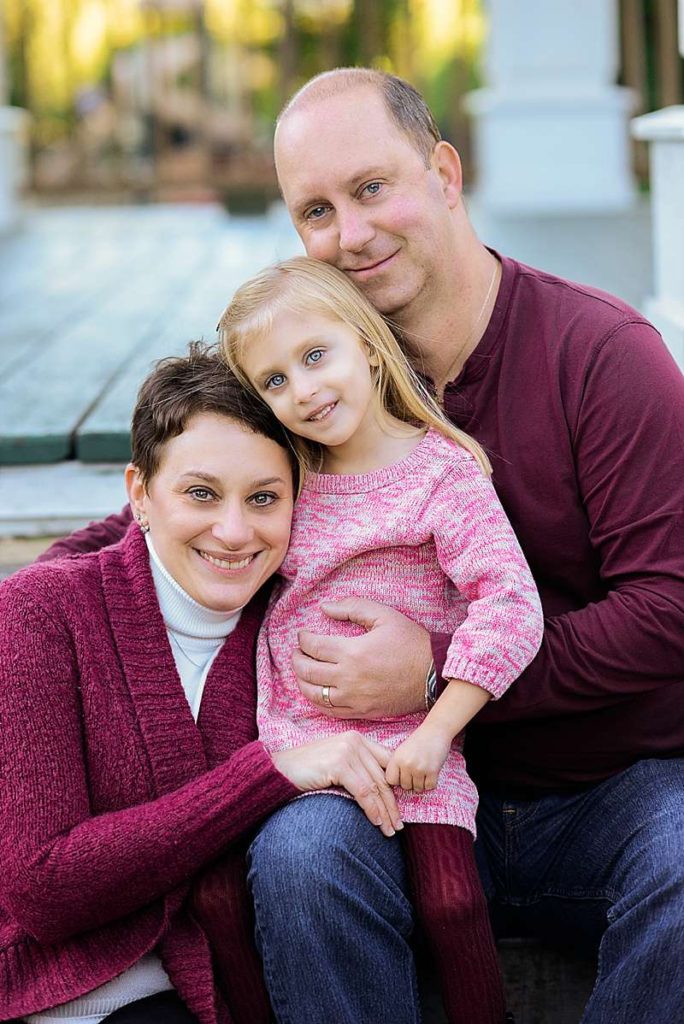 family of three pose