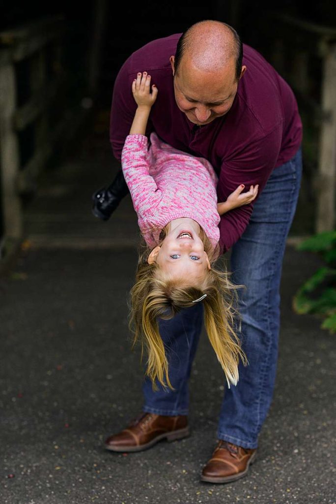 dad playing with his little girl