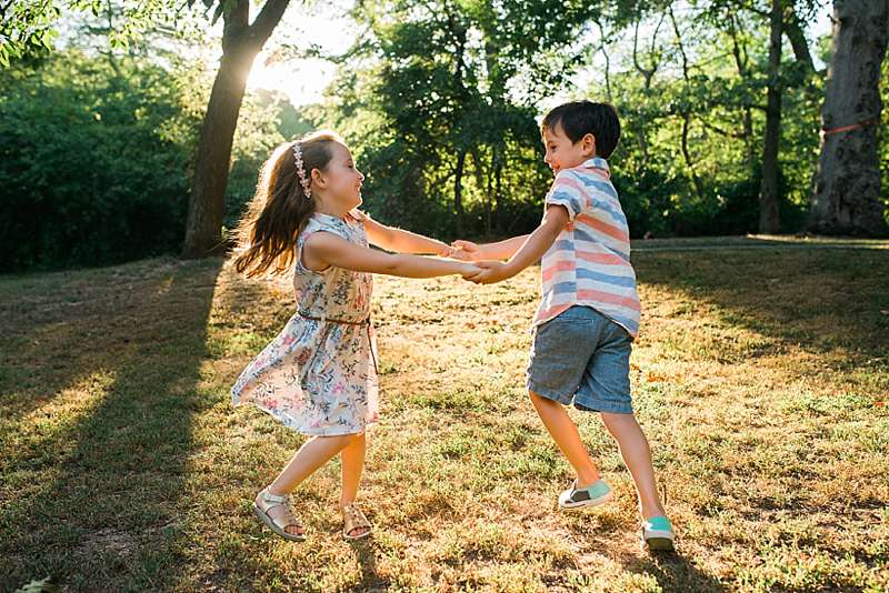 kids dancing in the sunshine