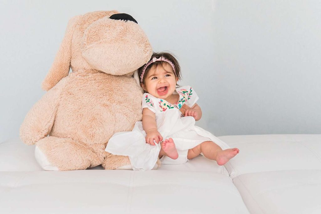 Long Island Child Photographer baby girl with big teddy bear