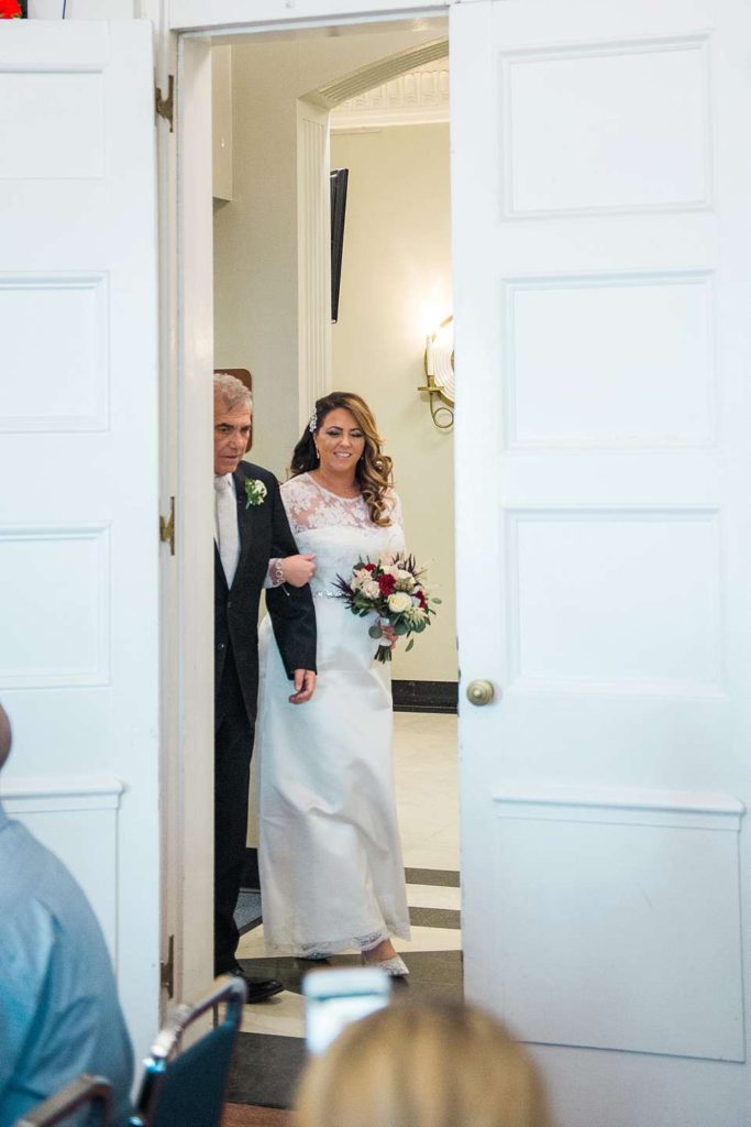 Long Island Wedding Photographer walking down the isle