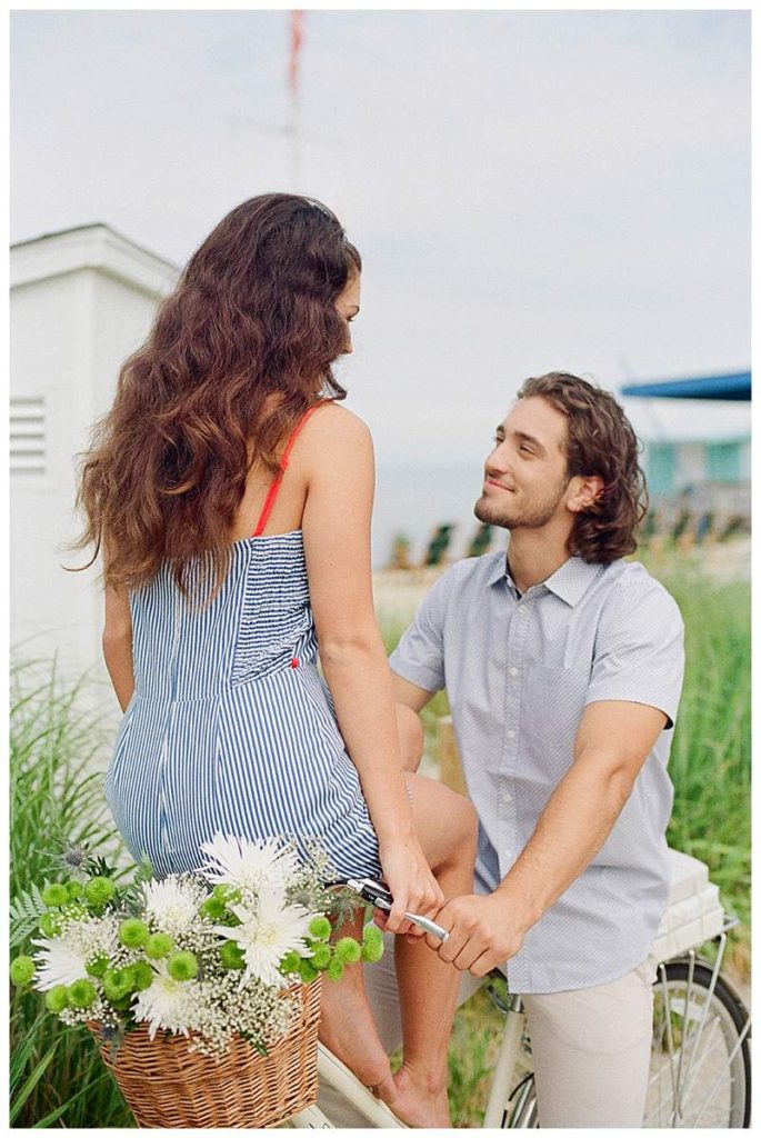 Long Island Film Beach Engagement romantic couple on bike