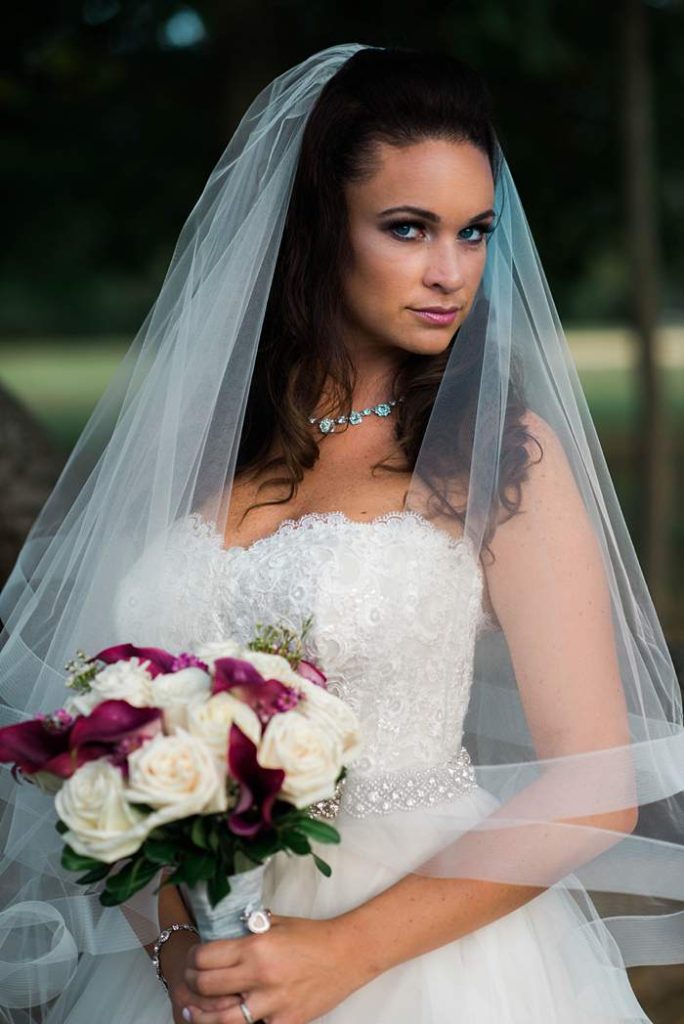Fun Long Island Wedding Photographer bride with veil and bouquet