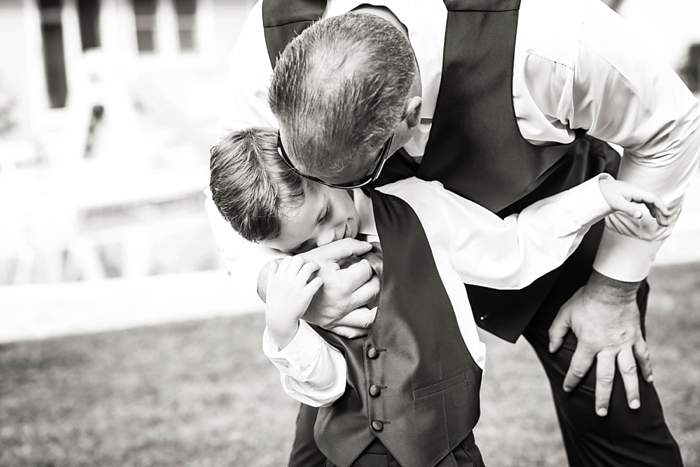 Fun Long Island Wedding Photographer bland and white dad and son