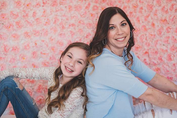 New York Mom and daughter photos back to back pose