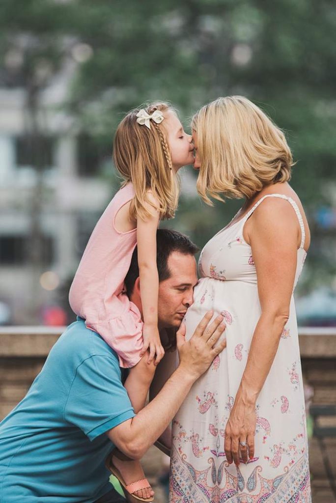 Bryant Park Family Maternity Photos mom dad and little girl
