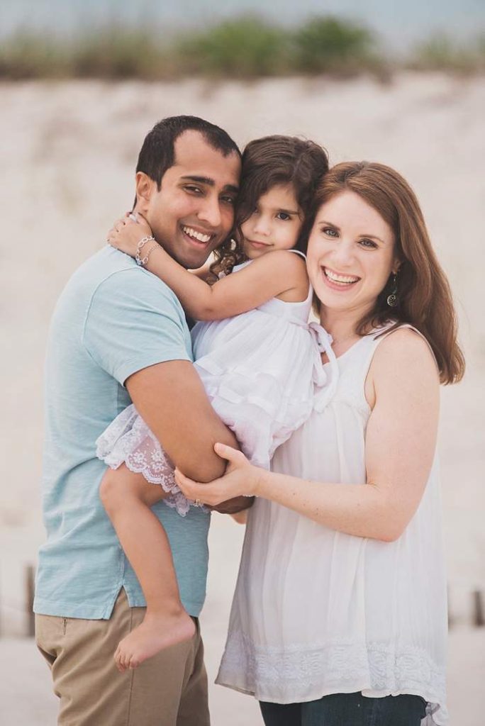 Lynbrook Family Photos standing cuddle pose