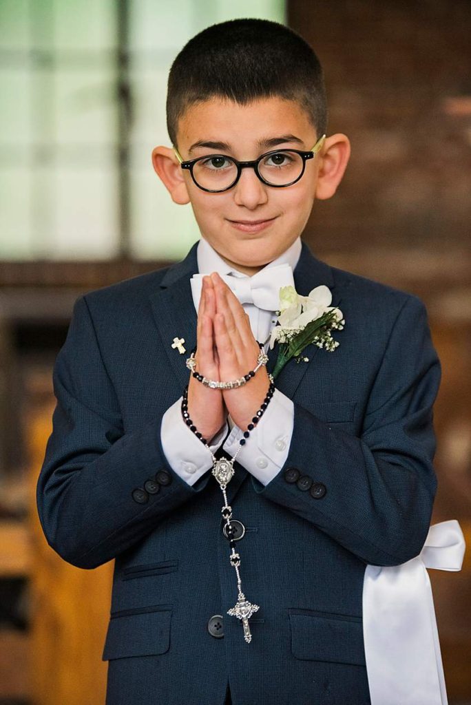 Long Island Communion Photos boy with rosaries