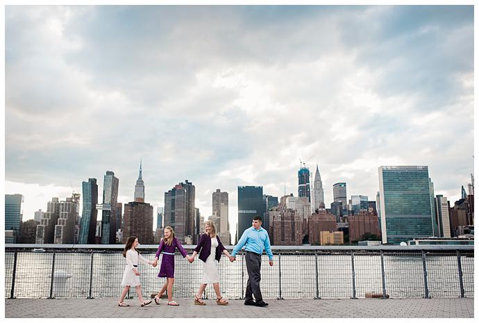 Family Photos Gantry Park walking with manhattan skyline in background