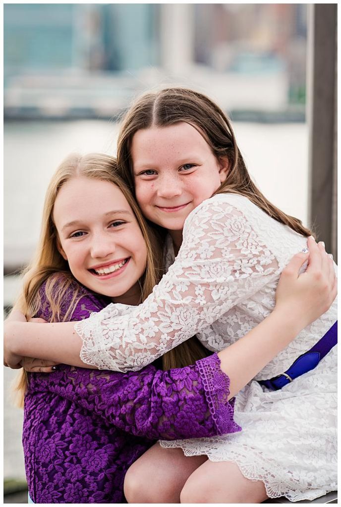 Family Photos Gantry Park sisters by the water