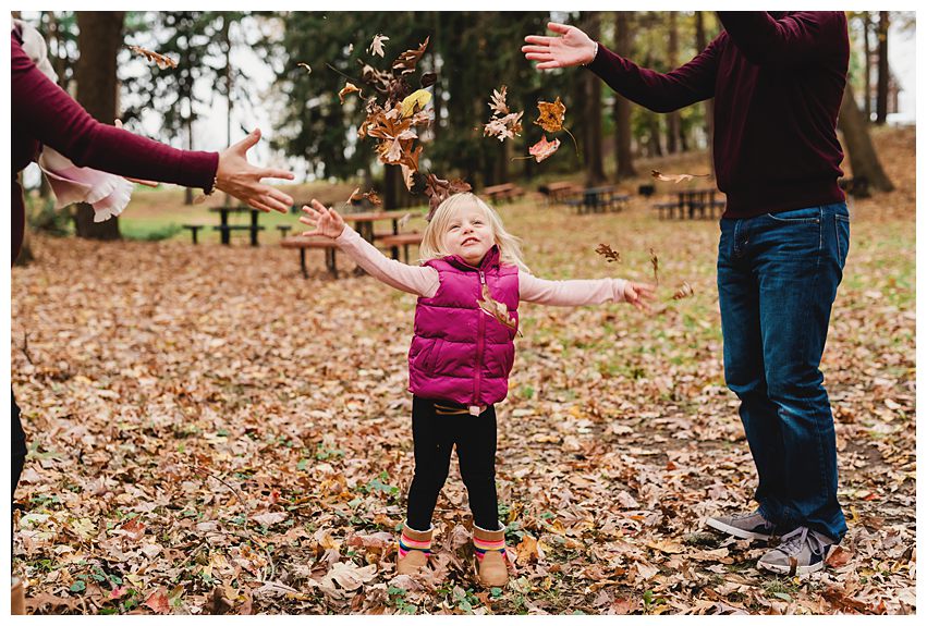 Plainview Family Photos throwing leaves