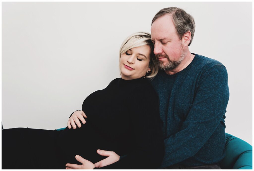 Boulder Denver Maternity Photos couch cozy pose