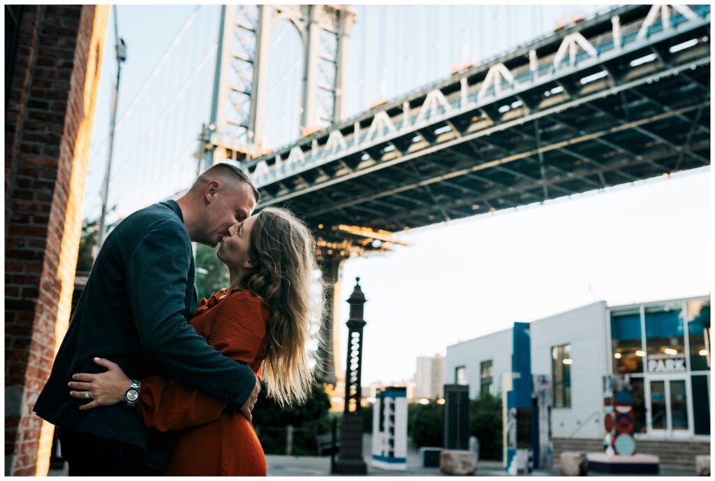 Brooklyn Bridge Engagement Photos kiss under the bridge