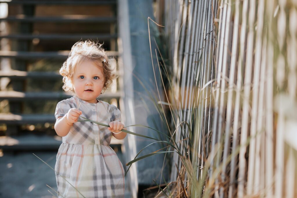 Leslie Renee Photography against the fence