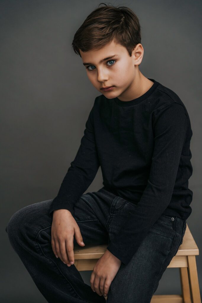 Child Actor Head Shots Long Island sitting pose