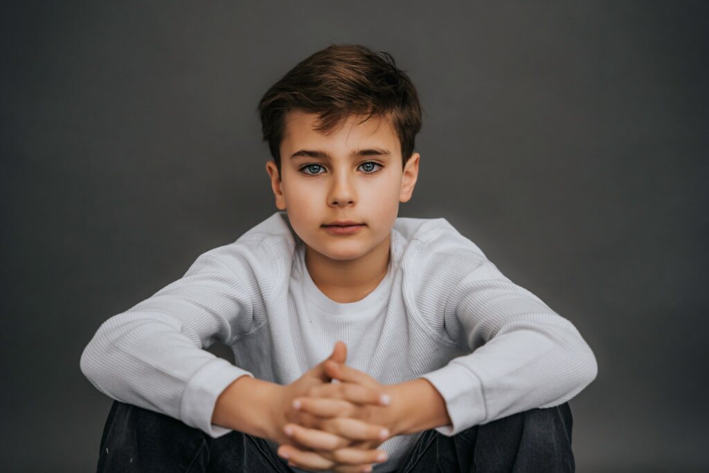 Child Actor Head Shots Long Island floor pose