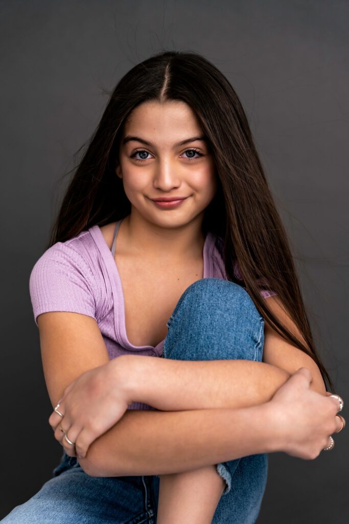 Studio Portraits for Teens Long Island NYC hug the knee