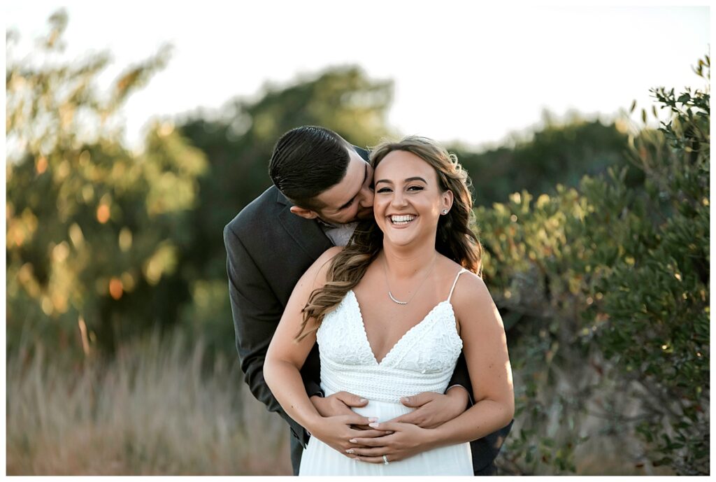 Howard beach couple beach engagement photos whisper pose