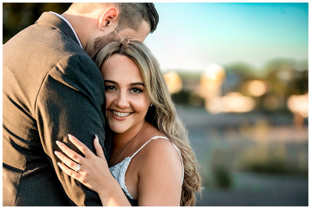 Howard beach couple beach engagement photos sweet hug