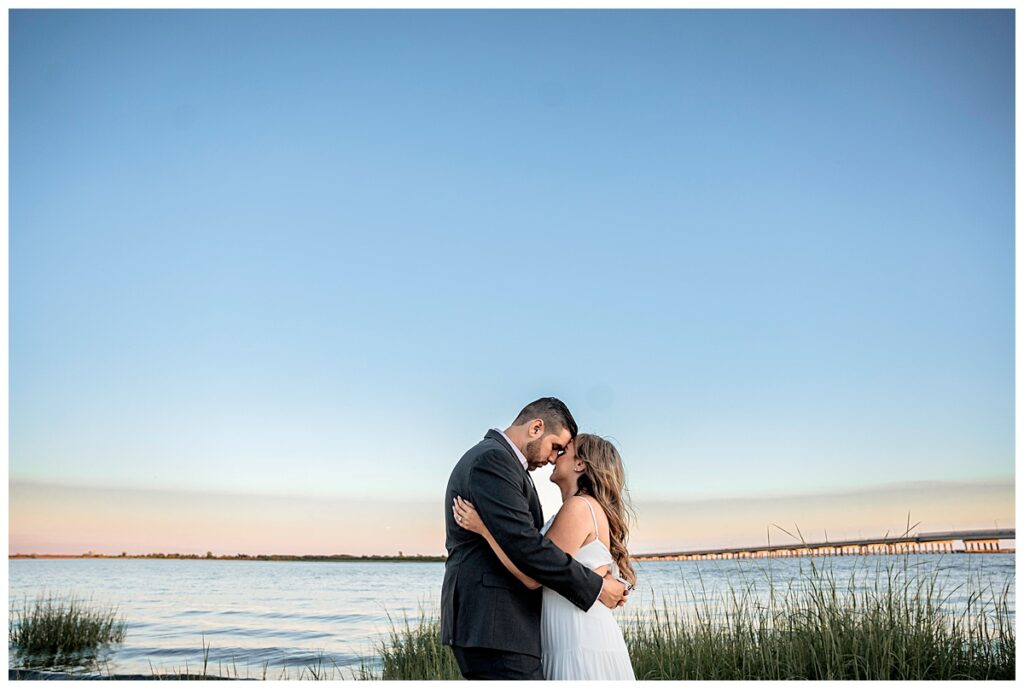 Howard beach couple beach engagement photos negative space sky