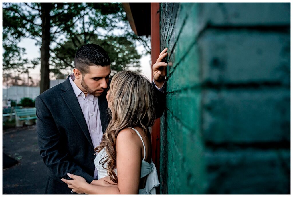 Howard beach couple beach engagement photos kiss