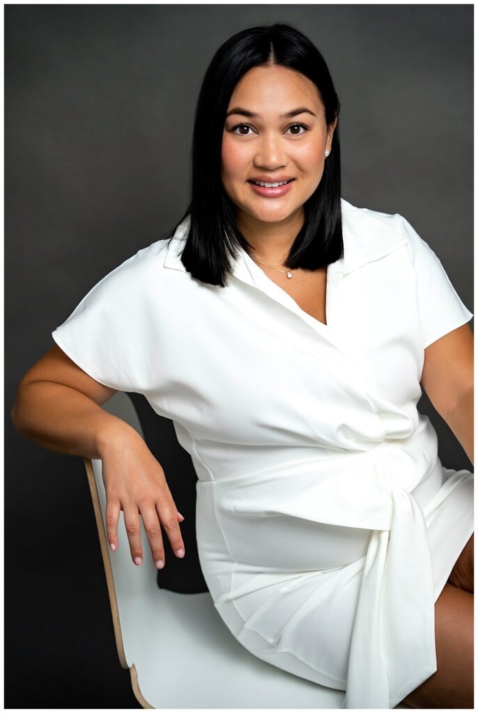 Realtor Contemporary Professional Headshots leaning on a chair