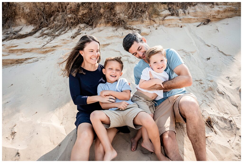 little boys on the beach with mom and dad fun