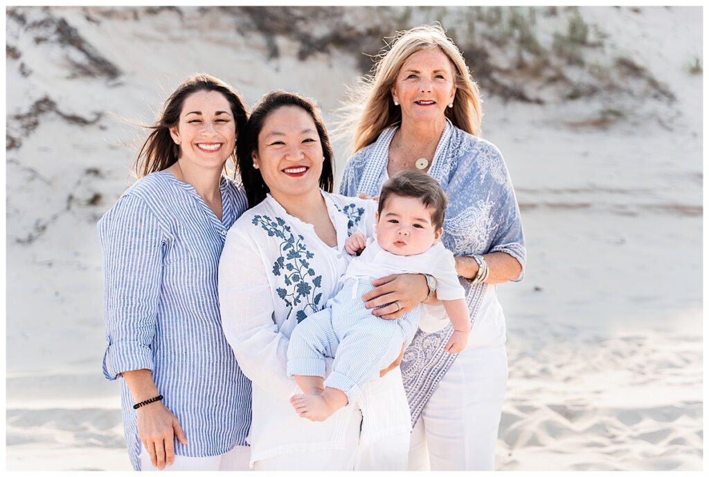 two moms and baby boy family photos on the beach grandma