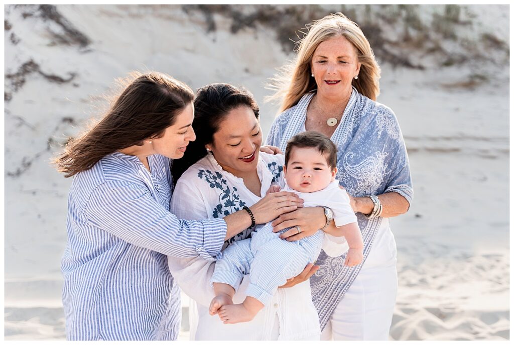 two moms and baby boy family photos on the beach morning session
