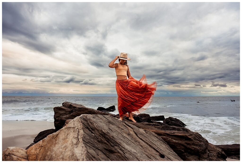 high end mother daughter portraits dramatic sky