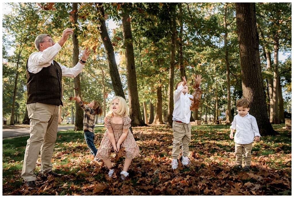 The Whole Big Family Together for Playful Photos throwing leaves