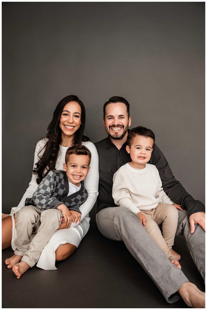 Sweet and Simple Family Photos in the Studio floor pose