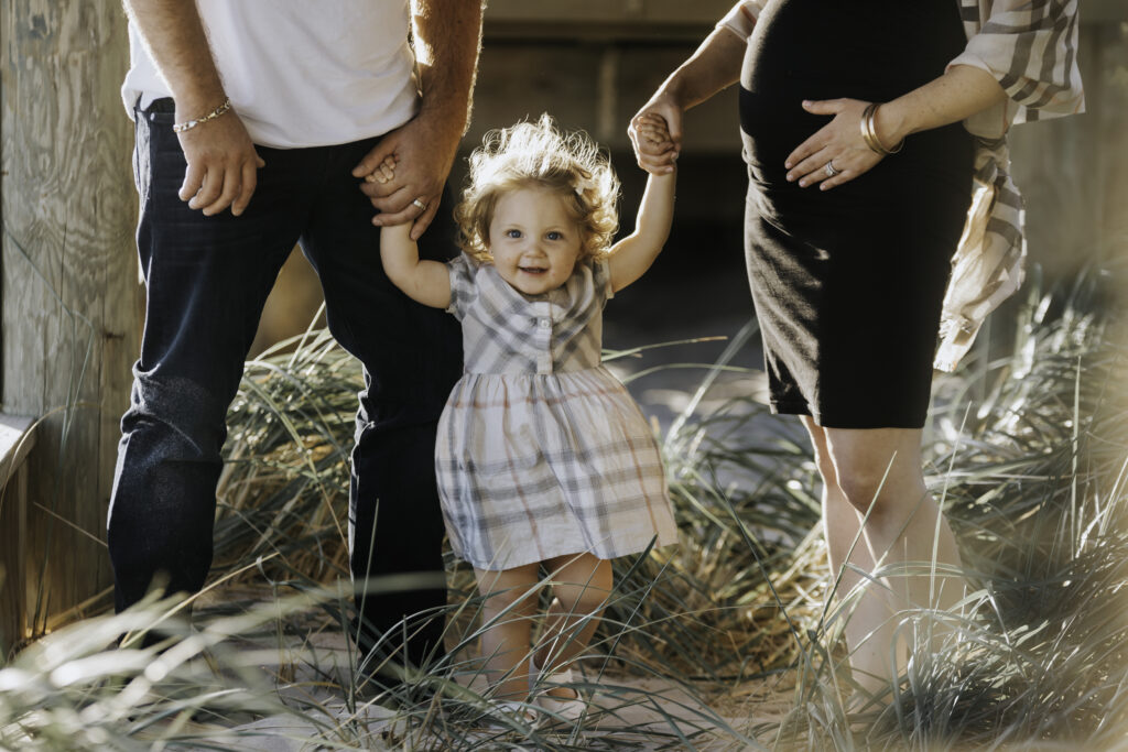 Adorable Big Sister and Baby Bump Family Photo toddler 