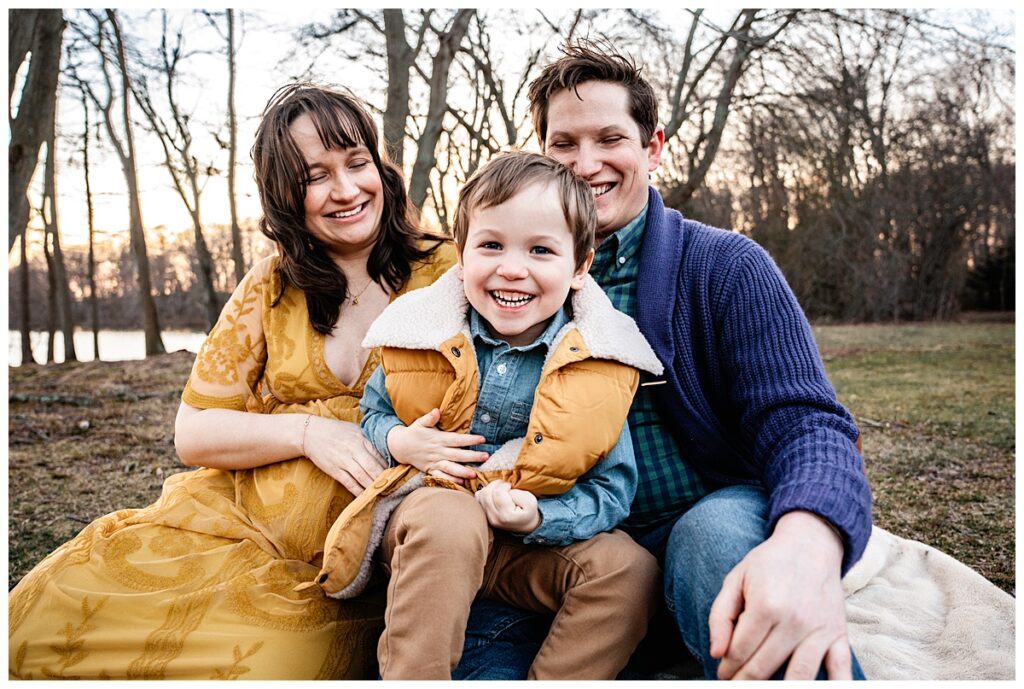 Sweet Family Photos with New Baby Bump cuddle pose