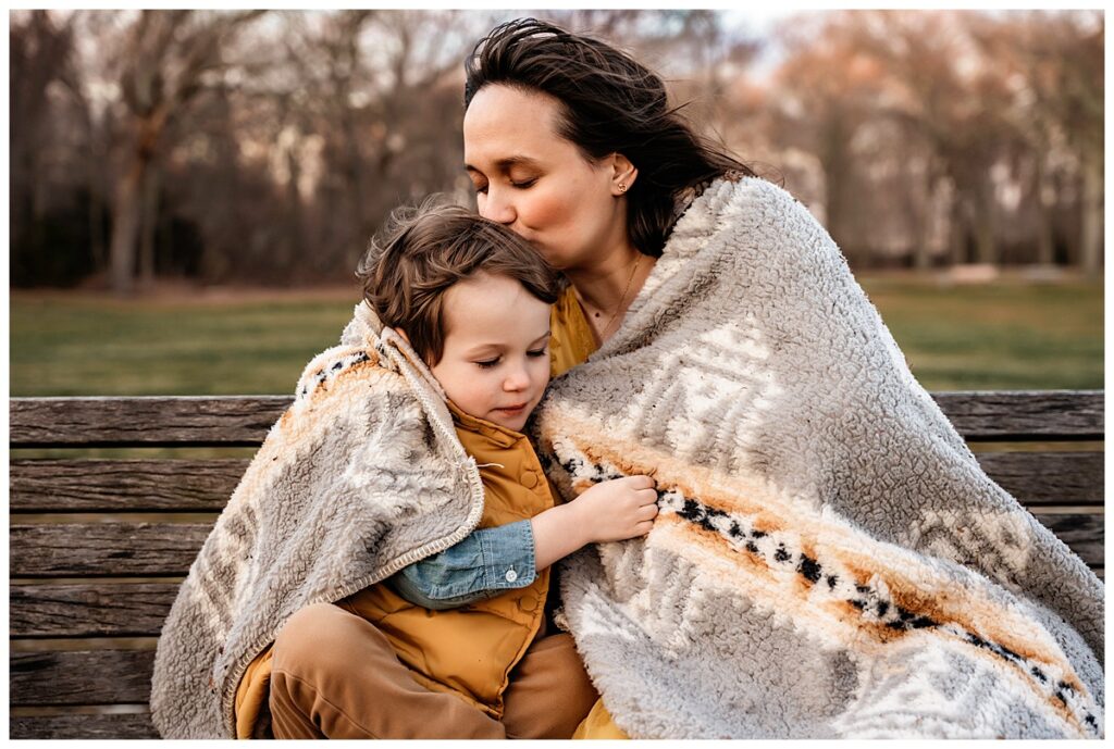 Sweet Family Photos with New Baby Bump mom and son cuddle