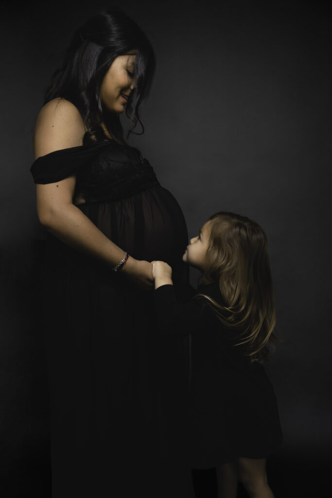 Dreamy Mommy and Me Maternity Photos in the Studio belly kiss