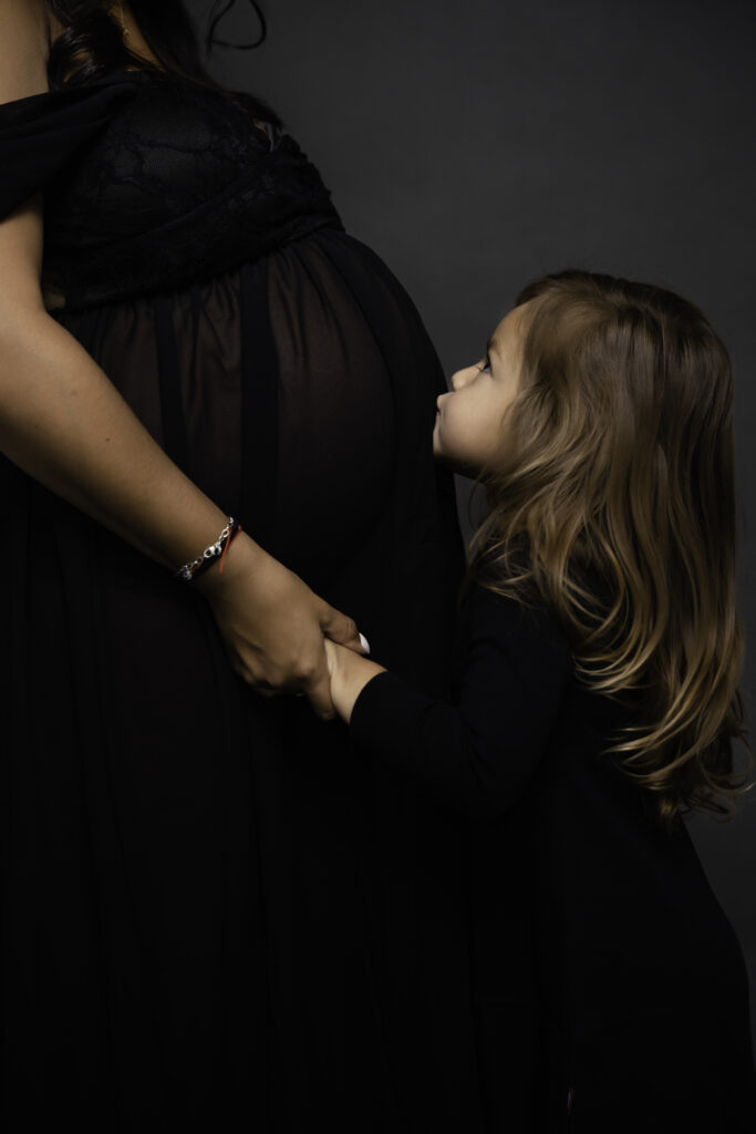 Dreamy Mommy and Me Maternity Photos in the Studio special moment 